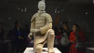 Majestic Display Of Terracotta Warriors In Museum Wallpaper