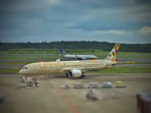 Majestic Etihad Airways Passenger Aircraft In Flight Wallpaper