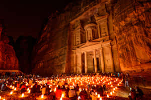 Majestic Night View Of The Treasury In Petra Wallpaper