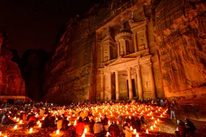 Majestic Night View Of The Treasury In Petra Wallpaper