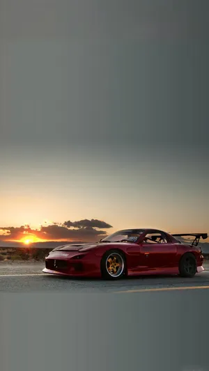 Majestic Red Mazda Rx 7 At Sunset Wallpaper