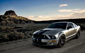 Majestic Silver Ford Mustang Shelby On Highway Wallpaper