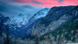 Majestic Sunset Over Rocky Mountains Wallpaper