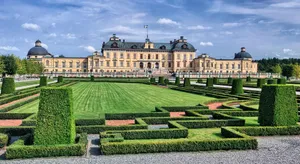 Majestic View Of Drottningholm Palace In Sweden Wallpaper