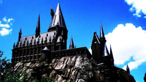 Majestic View Of Hogwarts Castle At Twilight Wallpaper