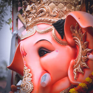 Majestic View Of Red-faced Lalbaugcha Raja Wallpaper