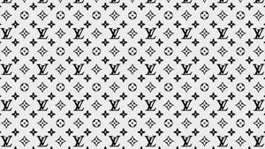 Make A Statement With Sophisticated Louis Vuitton Style Wallpaper