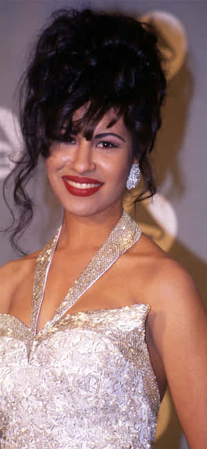 Make An Iconic Phone With This Selena Quintanilla Iphone Wallpaper Wallpaper