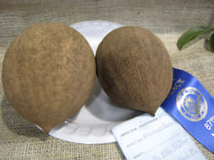 Mammee Apple Fruits In A Plate Wallpaper