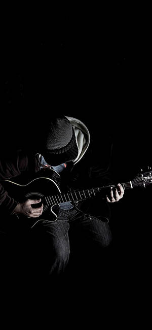 Man Playing Guitar Iphone Dark Wallpaper