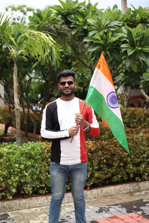 Man With Shades Holding Tiranga Wallpaper