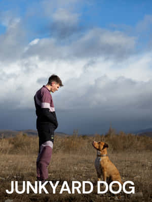 Manand Dog Staring Contest Wallpaper