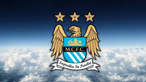 Manchester City Fc Logo Over The Cloudy Sky Wallpaper