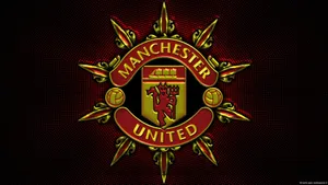 Manchester United Logo Ornate Gold Design Wallpaper