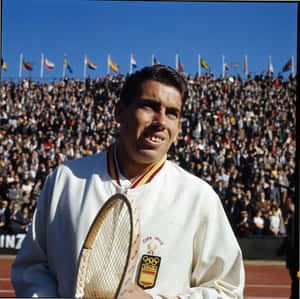 Manuel Santana Preparing For A Tennis Match Wallpaper