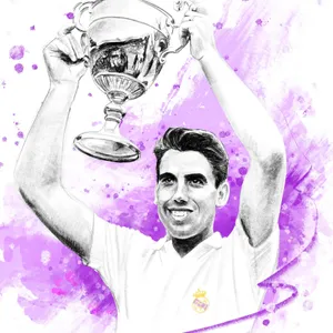 Manuel Santana Triumphantly Holding A Trophy Wallpaper