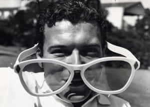 Manwith Oversized Sunglasses Wallpaper