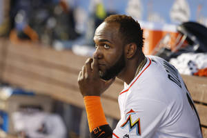 Marcell Ozuna With Thumb On Chin Wallpaper