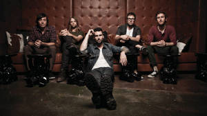 Maroon 5 Brown Leather Sofa Wallpaper