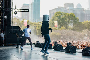 Marshmello Lights Up The Stage At Lollapalooza Wallpaper