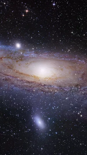 Marvel At The Beauty Of The Andromeda Galaxy Wallpaper