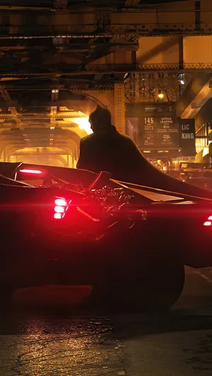 Marvel At The Sprawling Batman City Skyline At Night Wallpaper