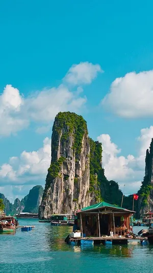 Massive Rock Formations In Halong Bay Wallpaper