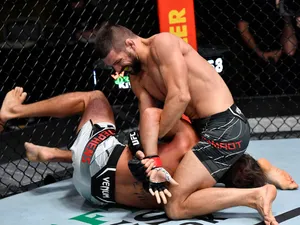 Mateusz Gamrot Tackling An Opponent Wallpaper