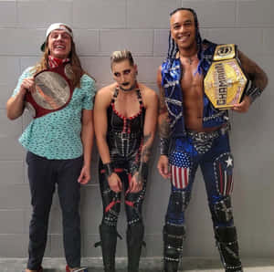 Matt Riddle With Rhea And Damian Wallpaper