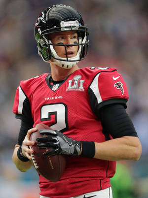 Matt Ryan Holding A Ball Wallpaper