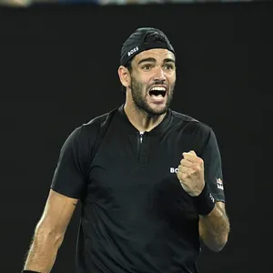 Matteo Berrettini Passionately Pumping His Fist During A Tournament Wallpaper
