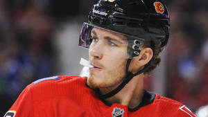 Matthew Tkachuk Side View Looking Afar Wallpaper