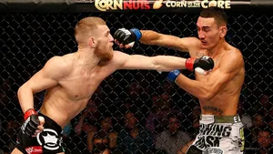 Max Holloway Vs Conor Mcgregor Wallpaper