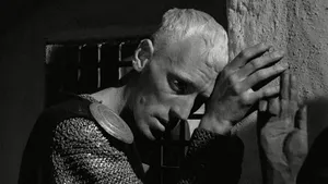 Max Von Sydow Holding A Hand Wallpaper