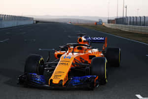 Mclaren Formula 1 Racing Team Revving Up For The Season Ahead Wallpaper