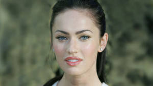 Megan Fox Gazing With Pretty Blue Eyes Wallpaper