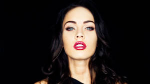 Megan Fox Looking Seductive With Her Signature Red Lips Wallpaper