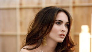 Megan Fox Looking Stunning In Beautiful Gold Earrings Wallpaper