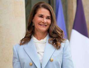 Melinda French Gates In Stylish Baby Blue Blazer Wallpaper