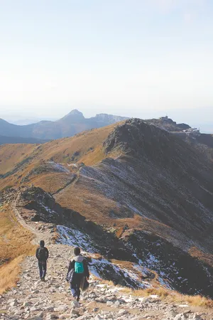 Men In Slovakia Mountain Peak Wallpaper