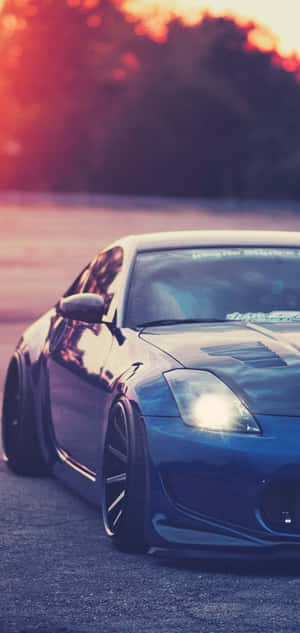 Metallic Blue Nissan 350z Iphone Wallpaper