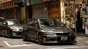 Metallic Gray Mitsubishi In Chinatown Wallpaper