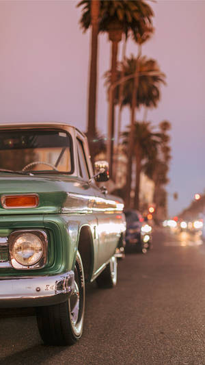 Metallic Green Car Retro Aesthetic Iphone Wallpaper