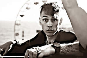 Mgk At The Amusement Park Wallpaper