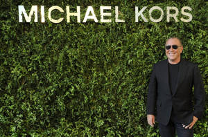 Michael Kors In All Black Outfit Wallpaper