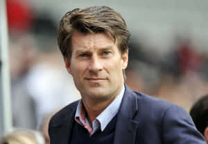Michael Laudrup Entering Event Venue Wallpaper
