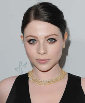 Michelle Trachtenberg Striking A Pose In A Stylish Outfit Wallpaper