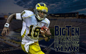 Michigan Wolverines Football Team In Action Wallpaper