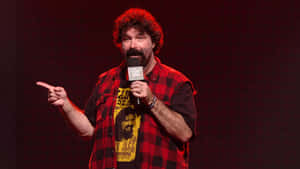 Mick Foley: A Wwe Legend Discussing His Journey Wallpaper