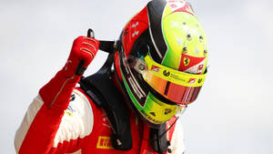 Mick Schumacher With Thumb-up Wallpaper